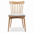 Wooden dining chair with cushioned seat and slatted back in natural finish