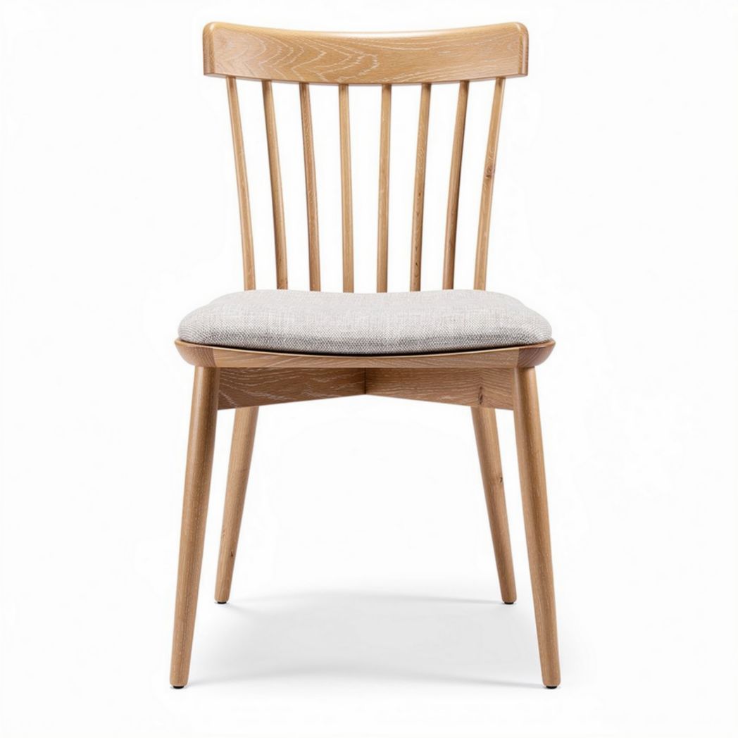 Wooden dining chair with cushioned seat and slatted back in natural finish